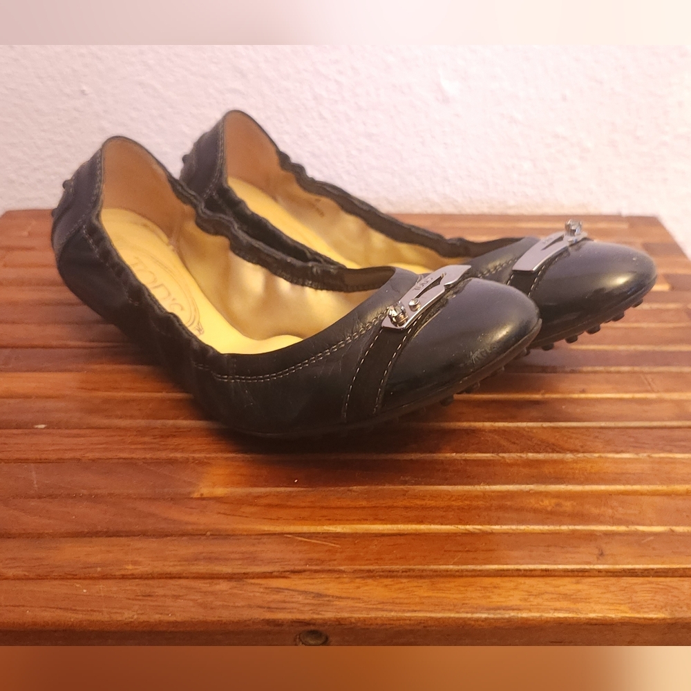 Tod's Black Leather Flats with Silver Accent